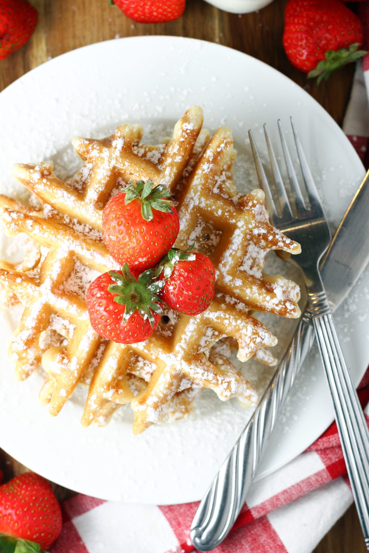 Overnight Yeast Waffles Topped With Macerated Strawberries