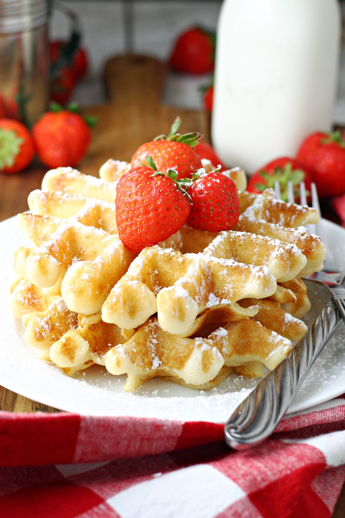 Overnight Yeast Waffles Topped With Macerated Strawberries