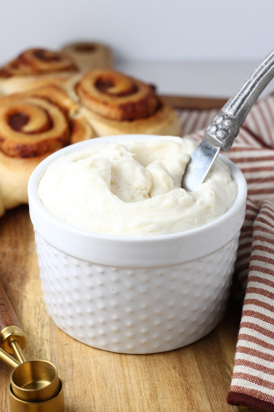 Dreamy Cream Cheese Drizzle Over Warm Cinnamon Rolls