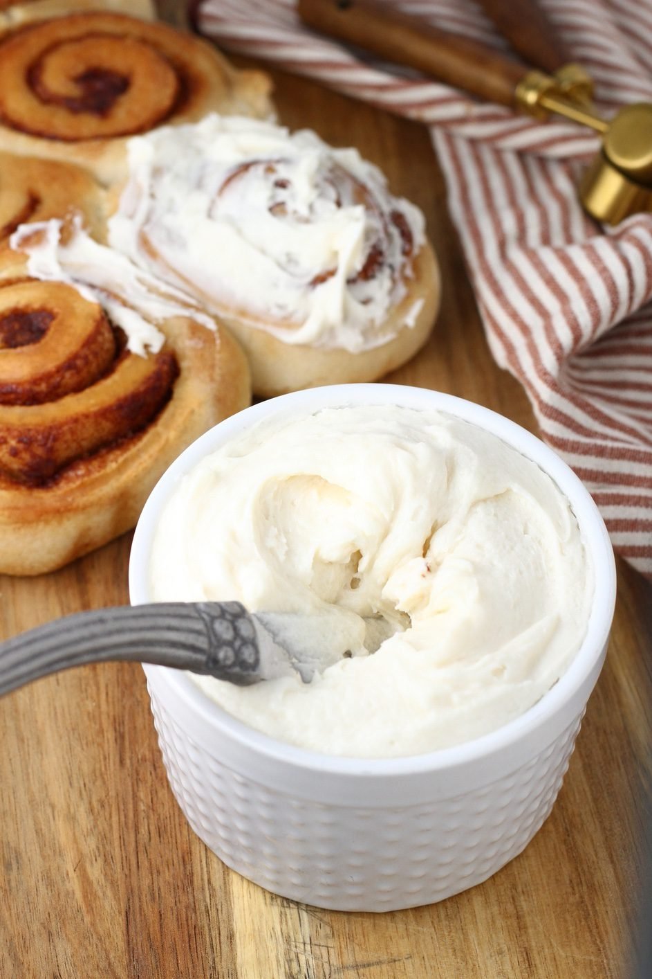 Dreamy Cream Cheese Drizzle Over Warm Cinnamon Rolls